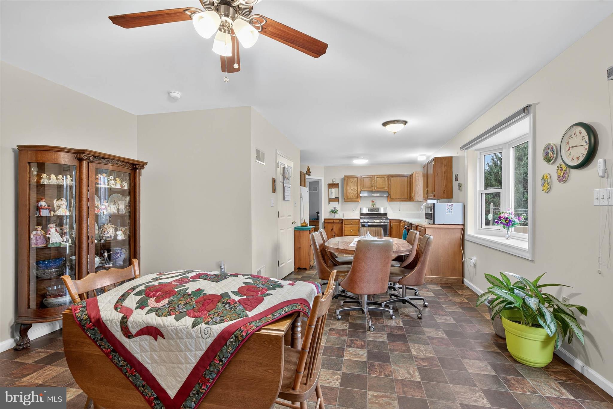 213 East 6th Street Lititz, PA 17543 - Photo 19 of 46 a bedroom with a bed and a chandelier