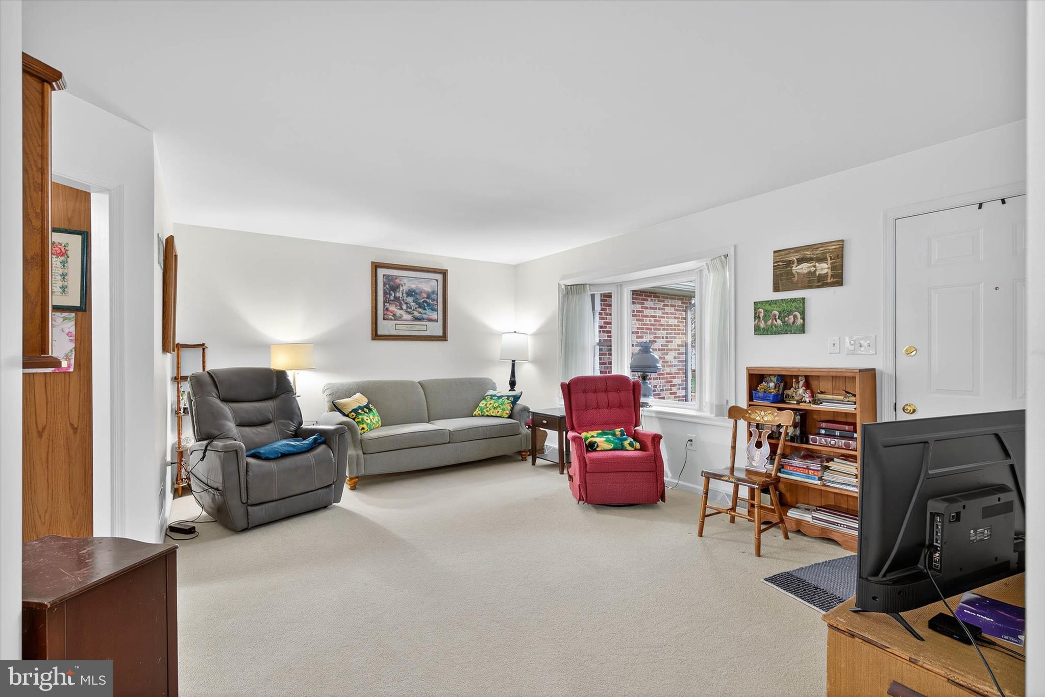 213 East 6th Street Lititz, PA 17543 - Photo 9 of 46 a living room with furniture and a flat screen tv