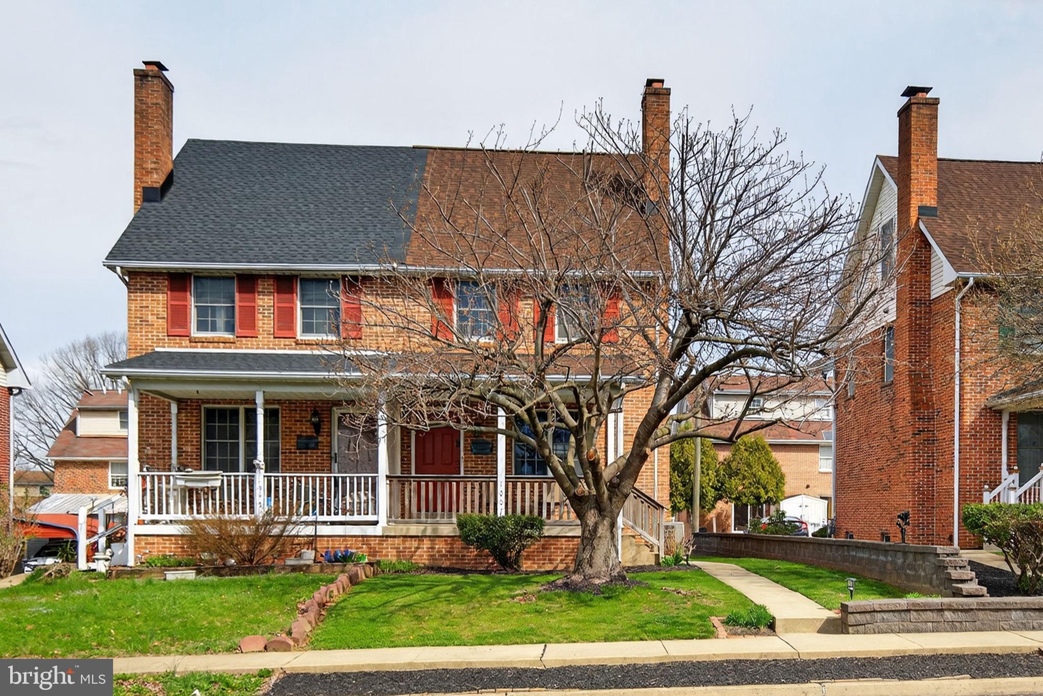 1007 East Walnut Street Lancaster, PA 17602 - Photo 1 of 35 front view of a house with a yard