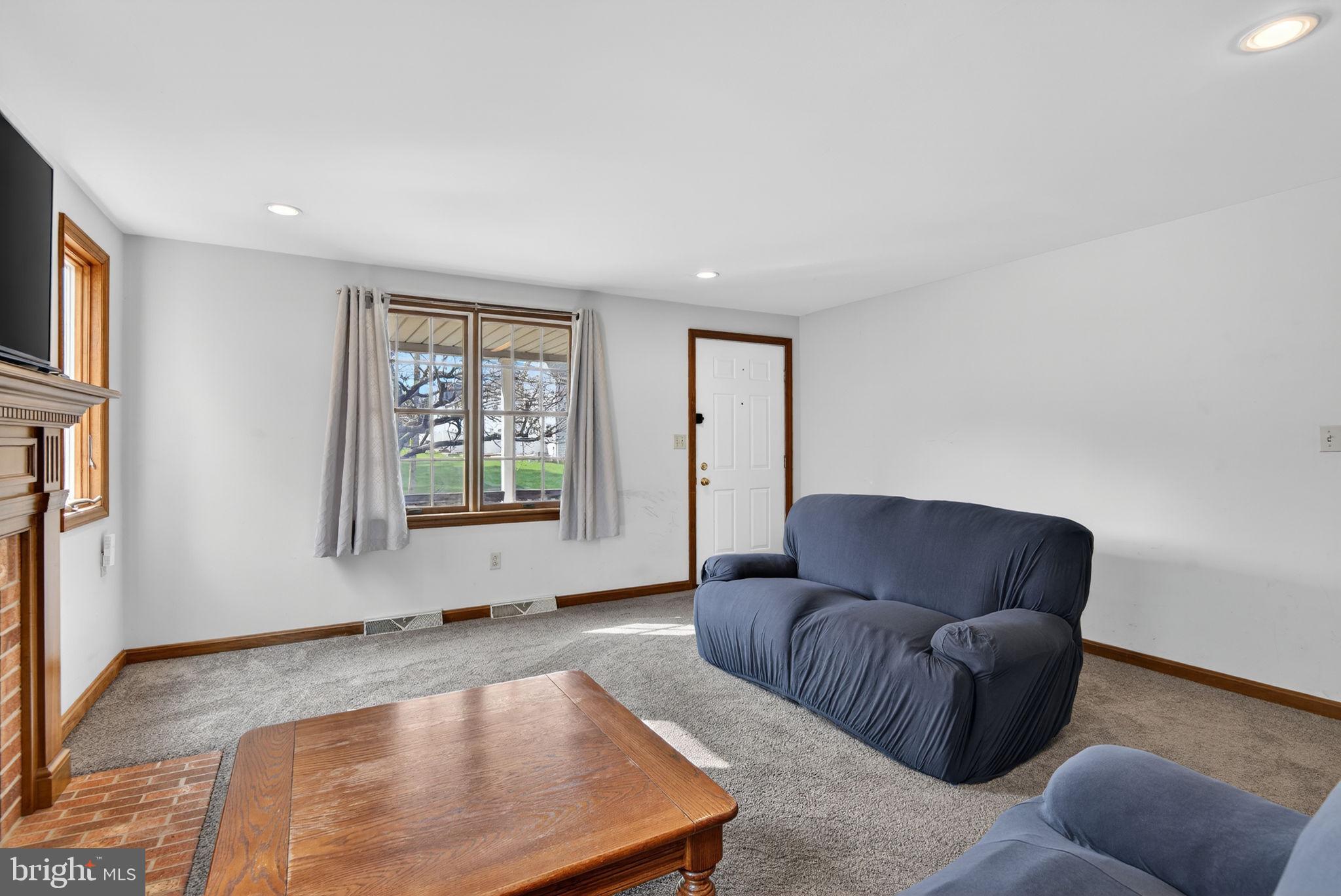 1007 East Walnut Street Lancaster, PA 17602 - Photo 12 of 35 a living room with furniture and a window