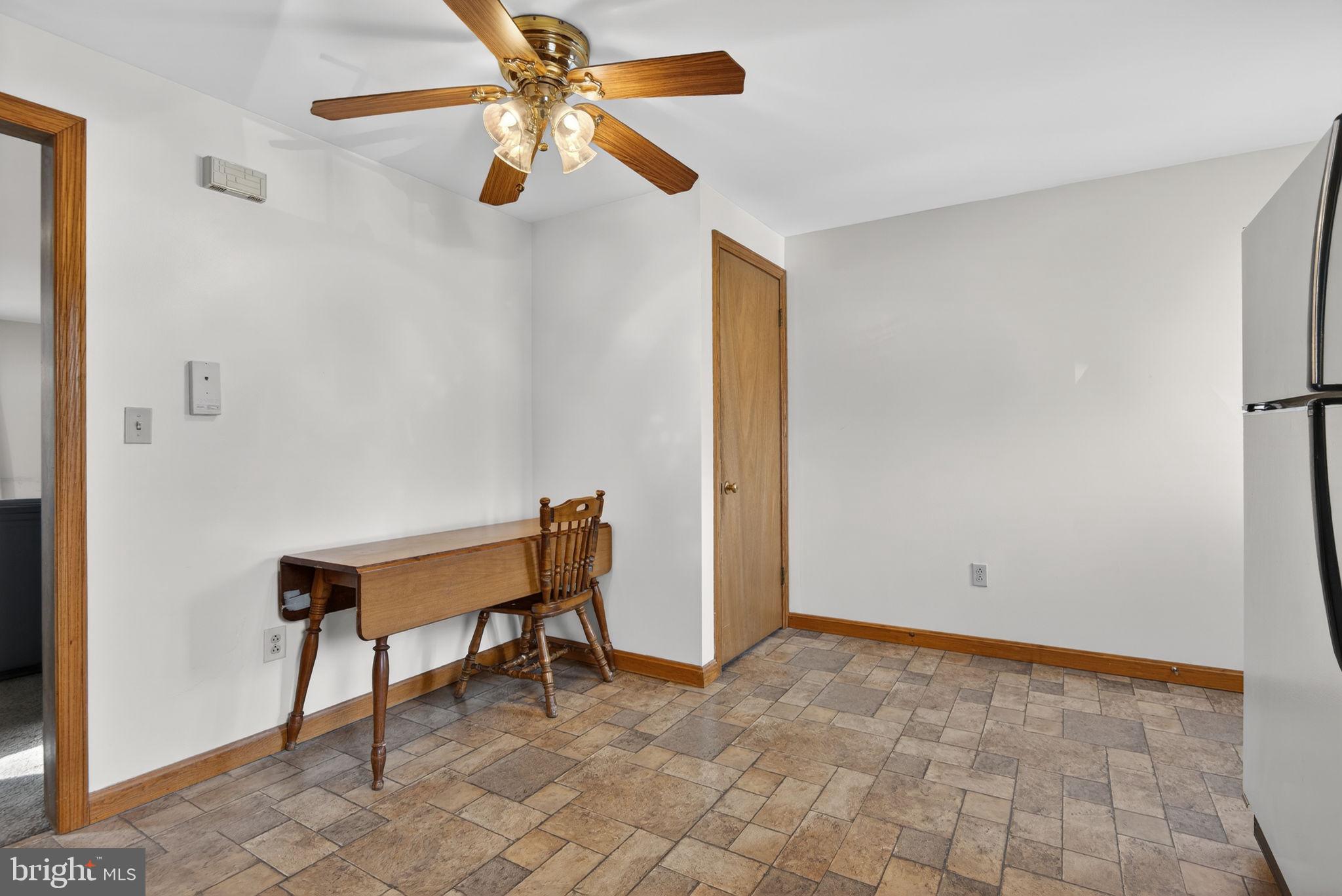 1007 East Walnut Street Lancaster, PA 17602 - Photo 17 of 35 a view of room with a ceiling fan and wooden floor