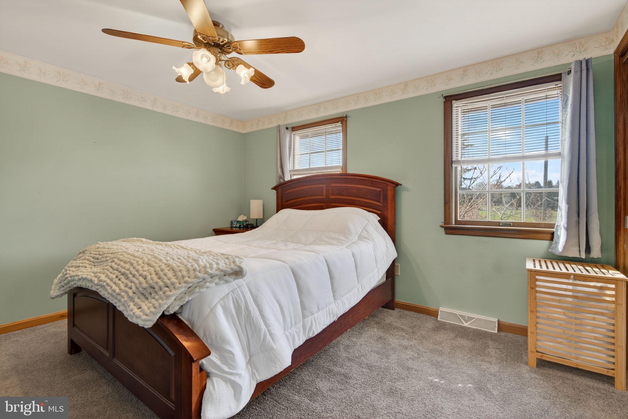 1007 East Walnut Street Lancaster, PA 17602 - Photo 20 of 35 a bedroom with a bed dresser and a window
