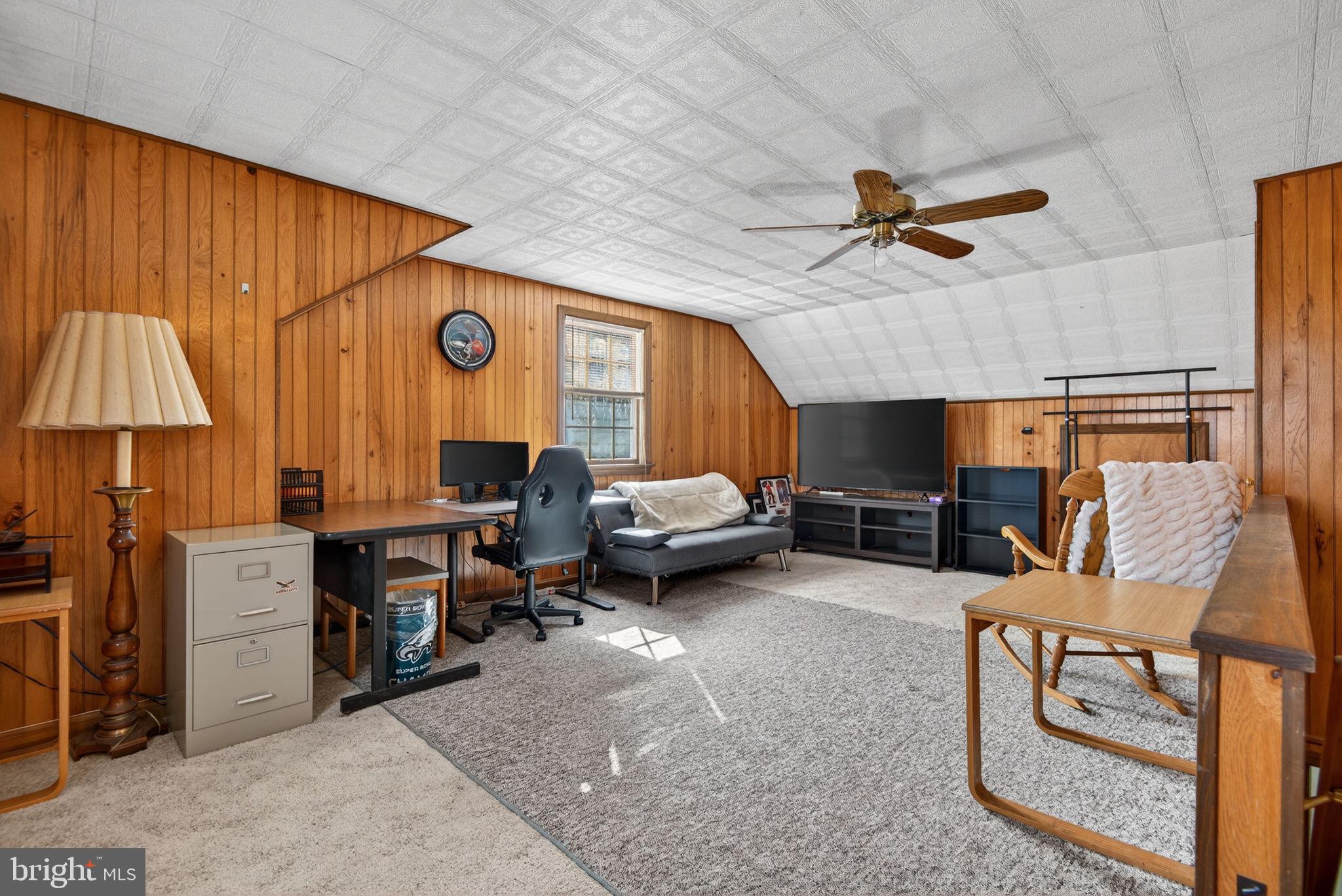 1007 East Walnut Street Lancaster, PA 17602 - Photo 26 of 35 a view of a livingroom with furniture and a ceiling fan