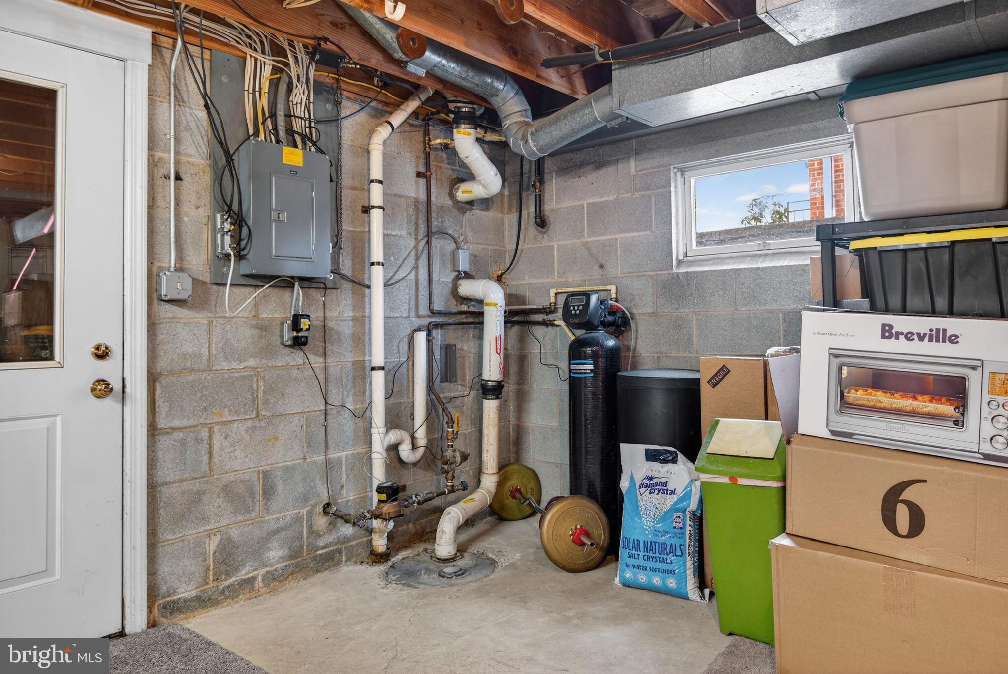 1007 East Walnut Street Lancaster, PA 17602 - Photo 32 of 35 a view of water heater room with washer and dryer