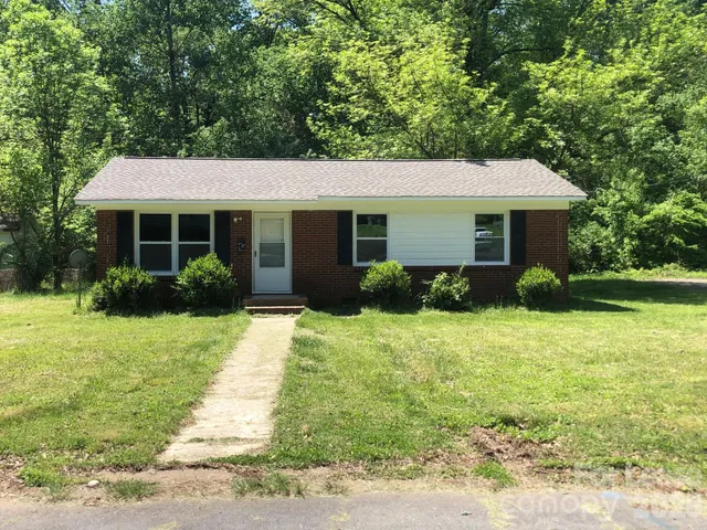 a view of a house with a garden