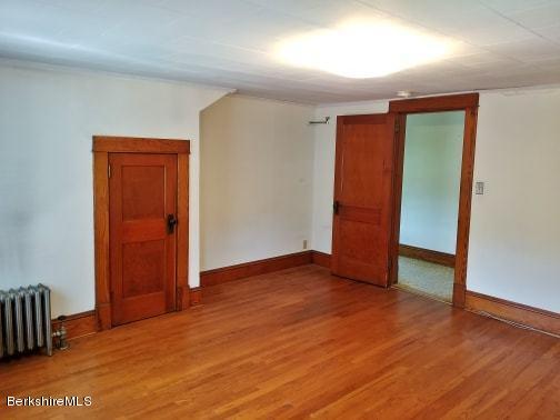 213 East Road Adams, MA 01220 - Photo 17 of 21 an empty room with wooden floor and closet
