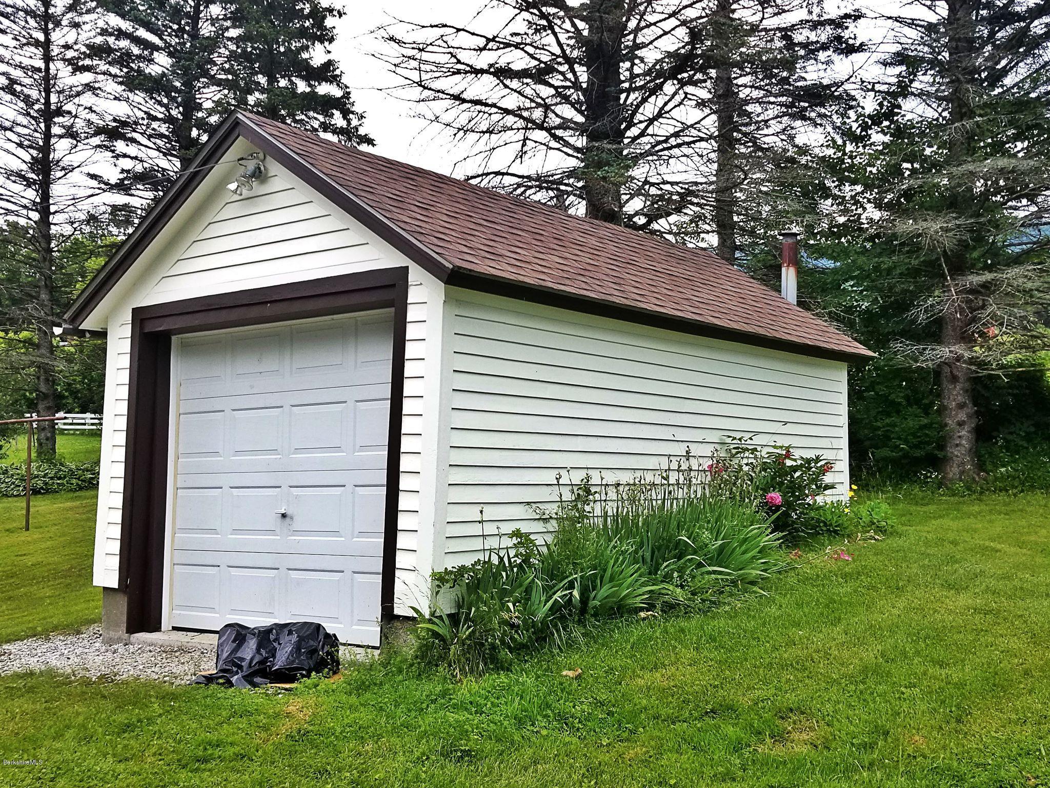 213 East Road Adams, MA 01220 - Photo 5 of 21 a view of a house with a backyard