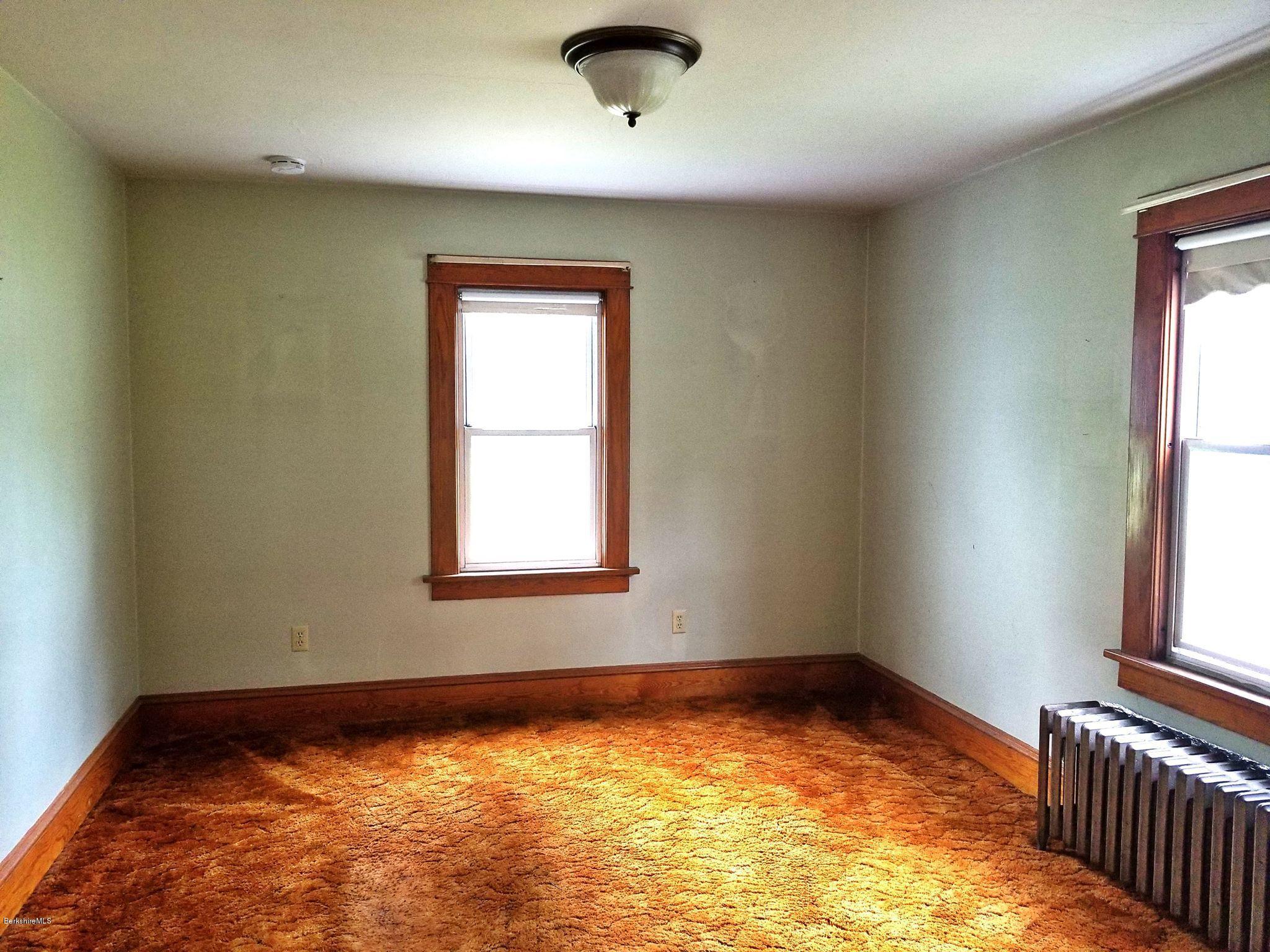 213 East Road Adams, MA 01220 - Photo 9 of 21 a view of an empty room and window
