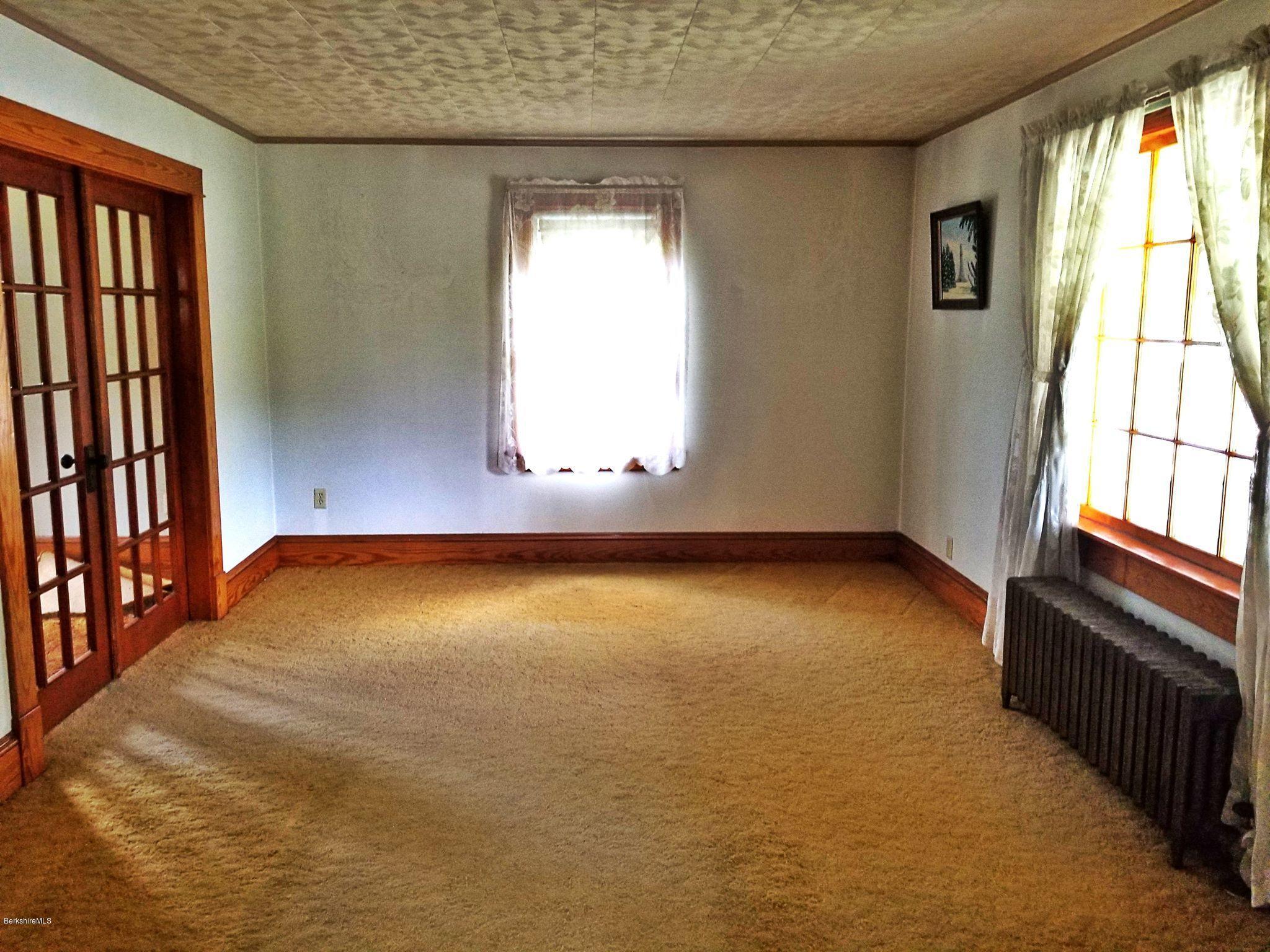 213 East Road Adams, MA 01220 - Photo 10 of 21 an empty room with windows