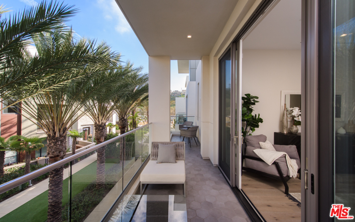 5918 Firefly Place Playa Vista, CA 90094 - Photo 18 of 34 a narrow alley way with a couch and stairs