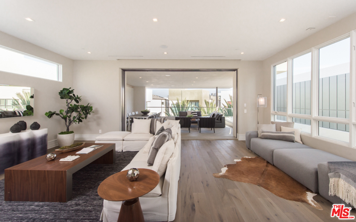 5918 Firefly Place Playa Vista, CA 90094 - Photo 30 of 34 a living room with furniture and a large window