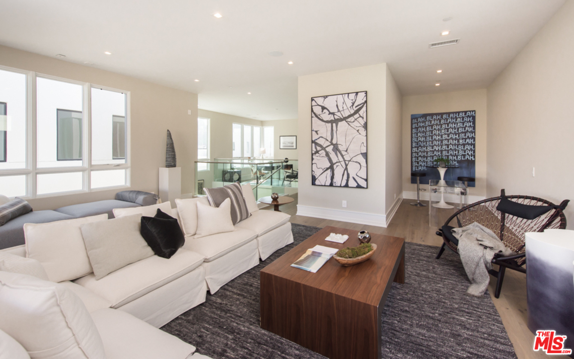 5918 Firefly Place Playa Vista, CA 90094 - Photo 31 of 34 a living room with furniture rug and window
