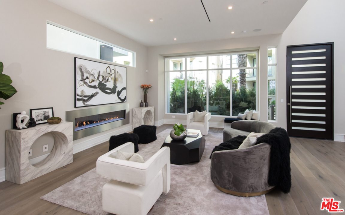 5918 Firefly Place Playa Vista, CA 90094 - Photo 5 of 34 a living room with furniture and a large window