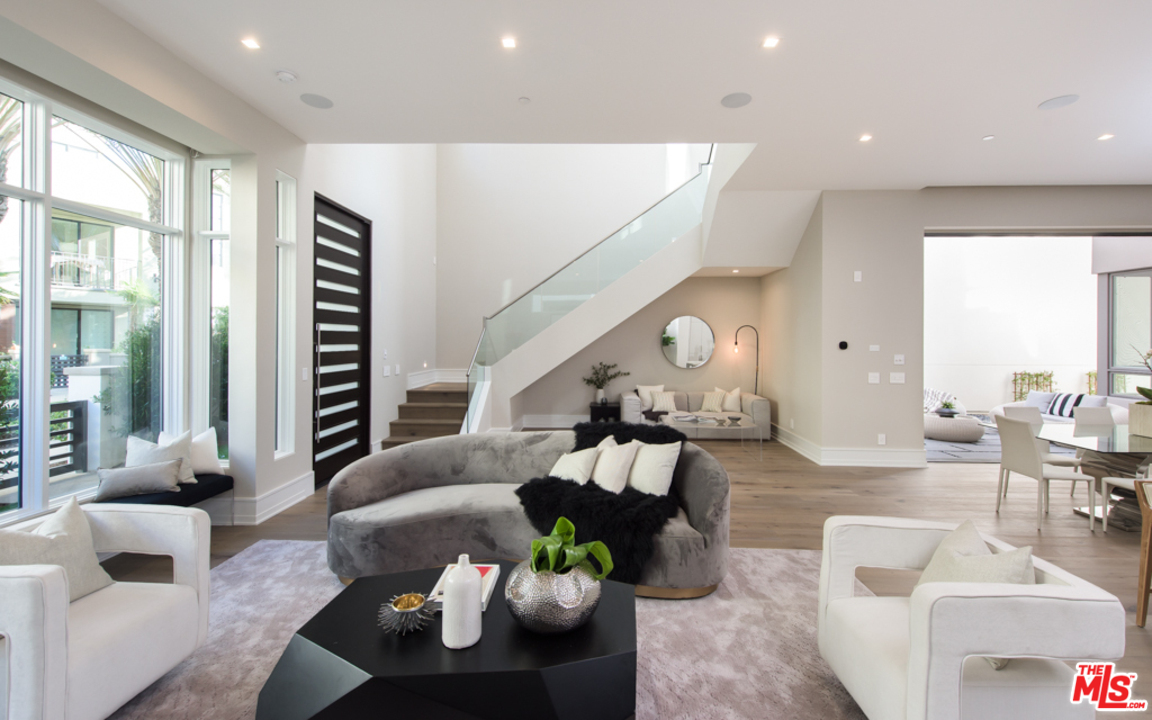 5918 Firefly Place Playa Vista, CA 90094 - Photo 6 of 34 a living room with furniture and a large window