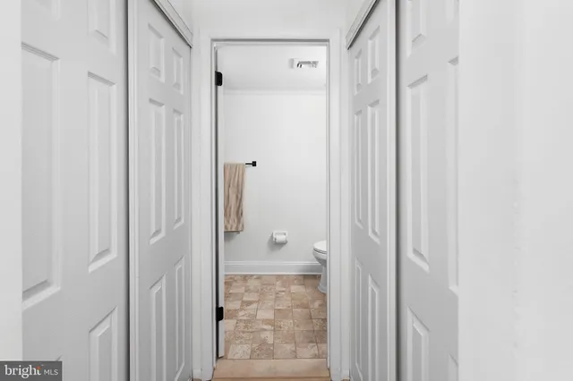 a bathroom with a shower and a sink