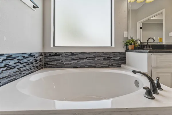 a bathroom with a bathtub