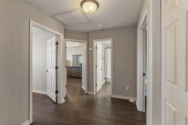 a view of entryway with wooden floor