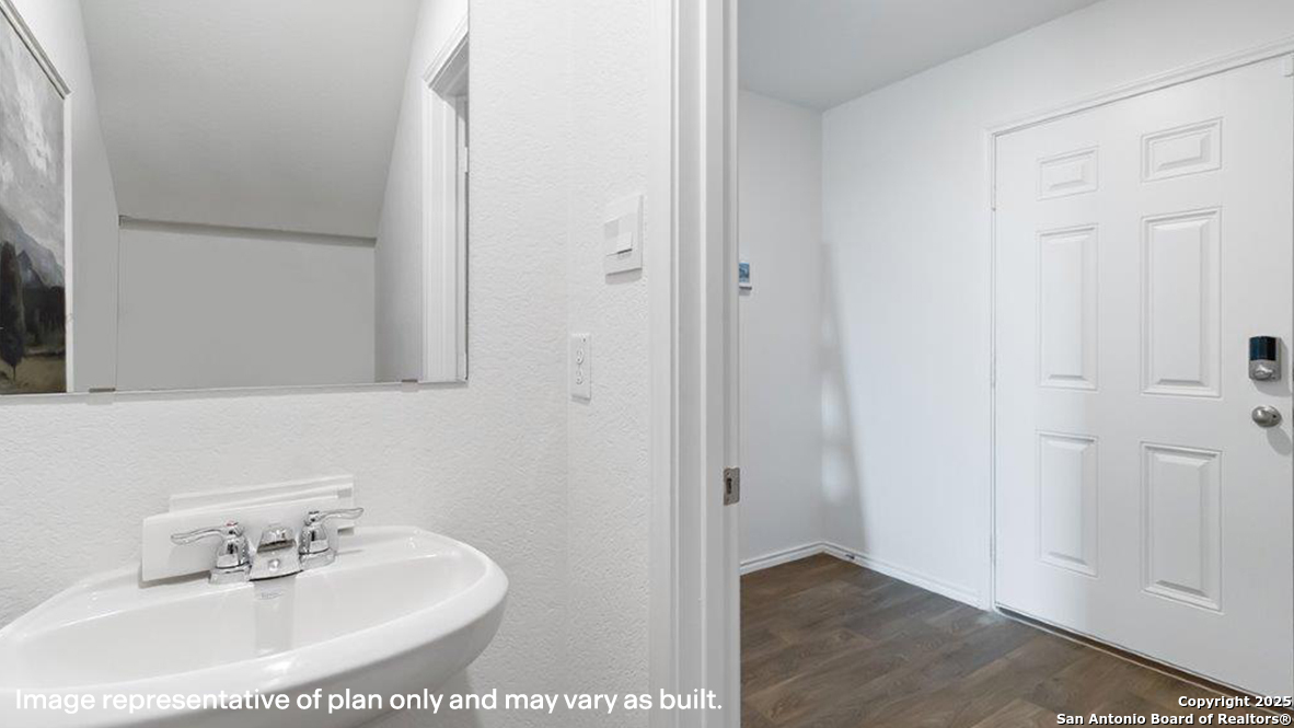 4903 Jackrabbit Converse, TX 78109 - Photo 19 of 49 a bathroom with a sink and a mirror