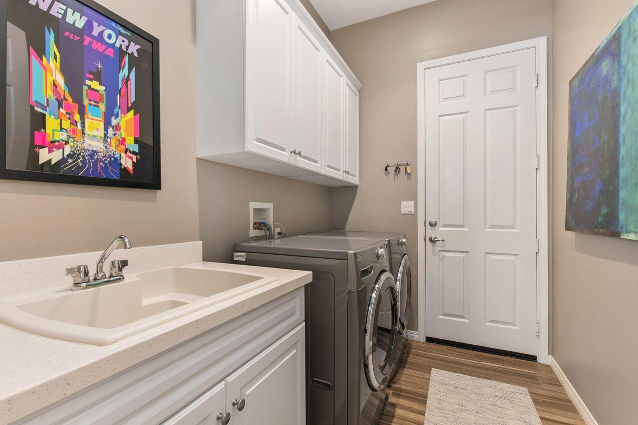 85559 Treviso Drive Indio, CA 92203 - Photo 22 of 30 a bathroom with a sink and a mirror