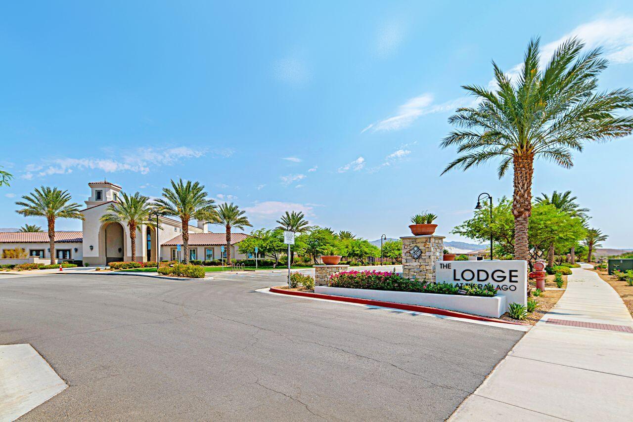 85559 Treviso Drive Indio, CA 92203 - Photo 28 of 30 a view of a street with a cars park palm trees