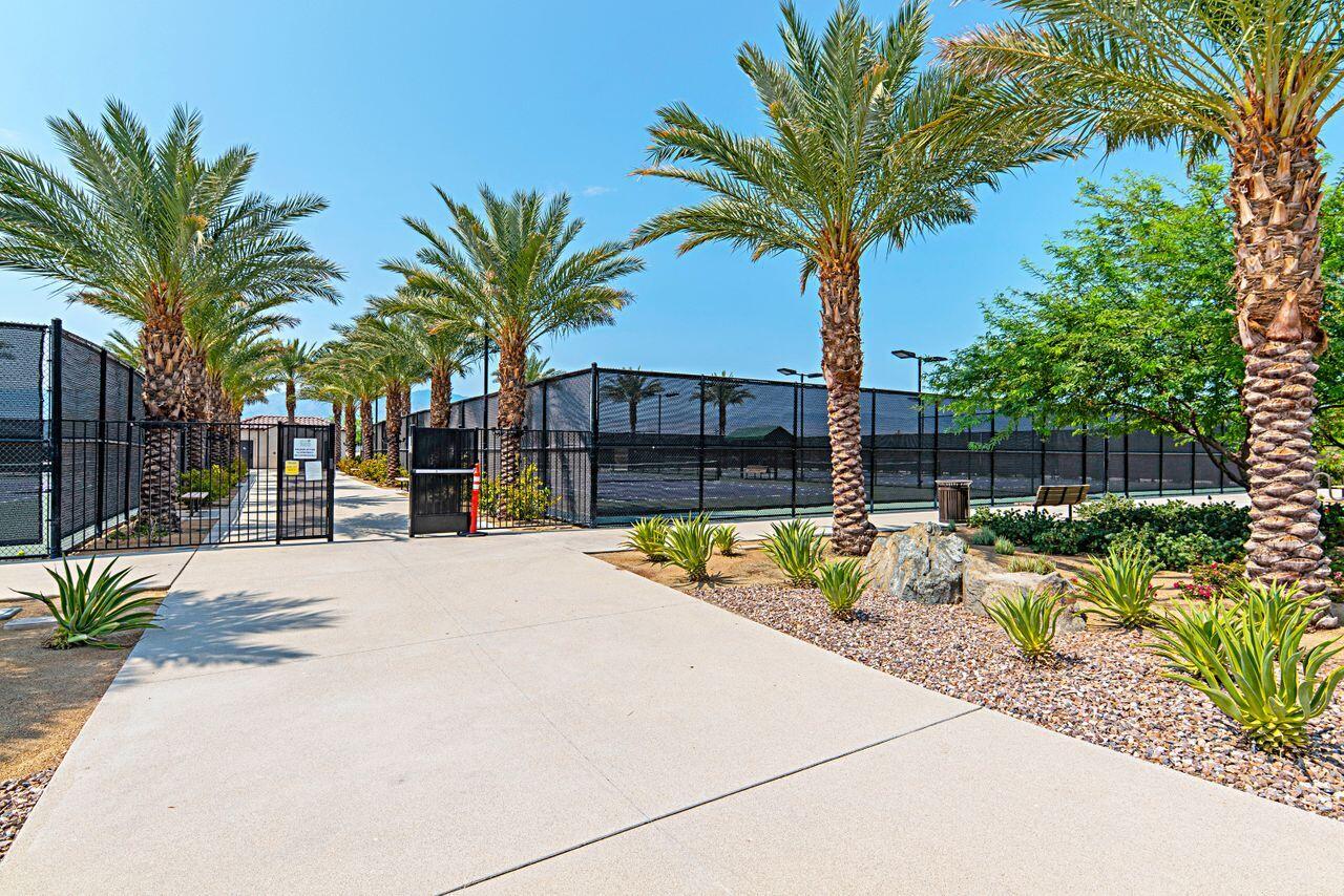 85559 Treviso Drive Indio, CA 92203 - Photo 29 of 30 a view of swimming pool with palm trees