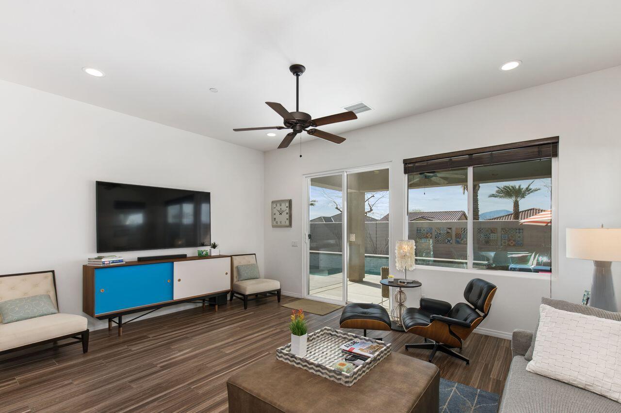 85559 Treviso Drive Indio, CA 92203 - Photo 7 of 30 a living room with furniture and a flat screen tv