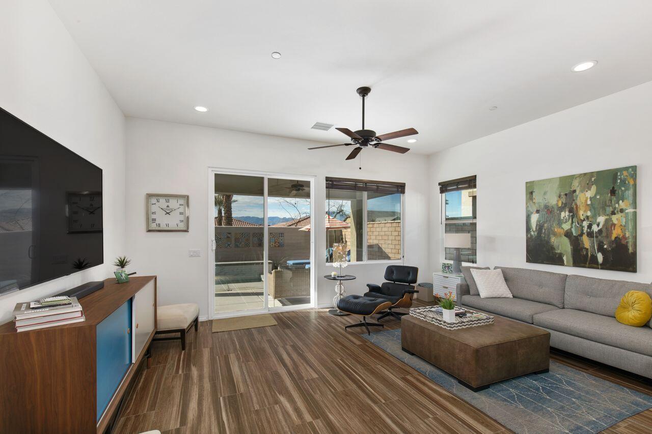 85559 Treviso Drive Indio, CA 92203 - Photo 8 of 30 a living room with furniture and a flat screen tv