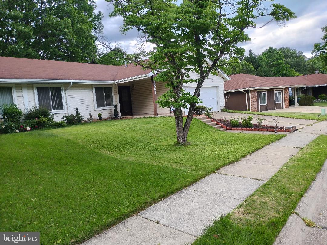 2841 Aquarius Avenue Silver Spring, MD 20906 - Photo 2 of 57 a front view of a house with a garden