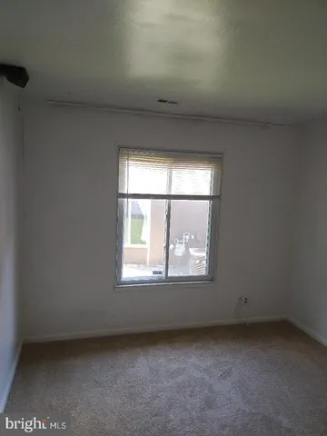 a view of a kitchen with a sink