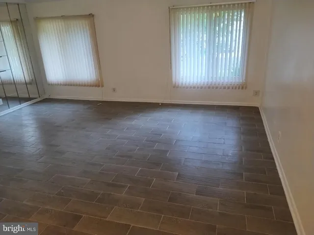 a view of kitchen with wooden floor