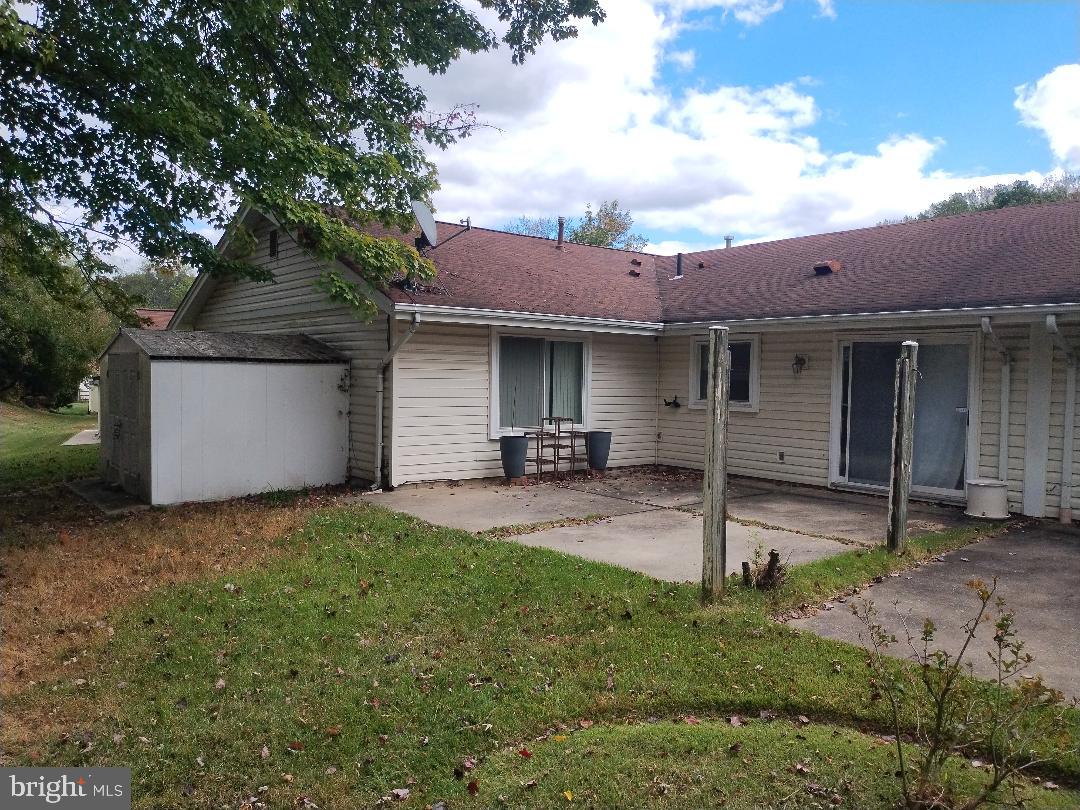 2841 Aquarius Avenue Silver Spring, MD 20906 - Photo 55 of 57 a front view of a house with a yard and garage
