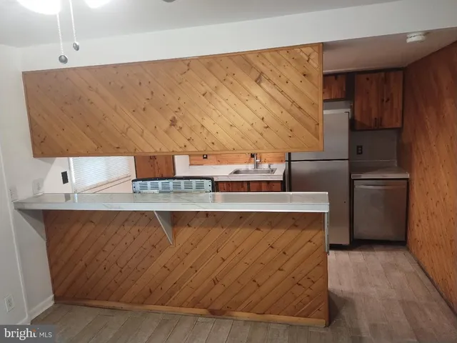 a utility room with washer and dryer