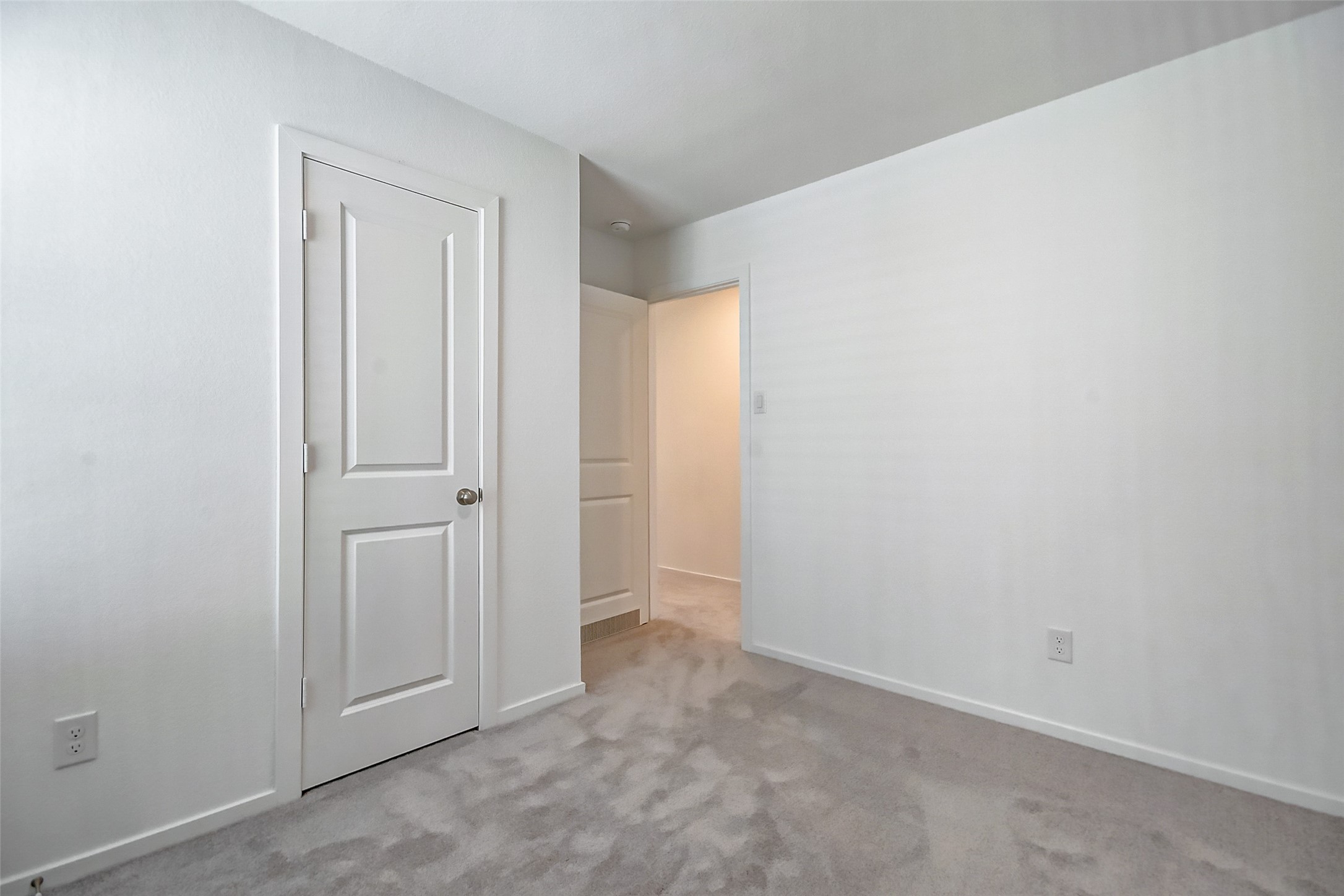 21535 Carosella Drive New Caney, TX 77357 - Photo 18 of 25 an empty room with closet area