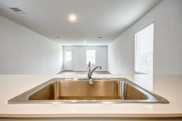 a view of parking area with cabinet