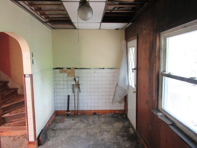 124 Irwin Street McKees Rocks, PA 15136 - Photo 11 of 18 a view of empty room with windows