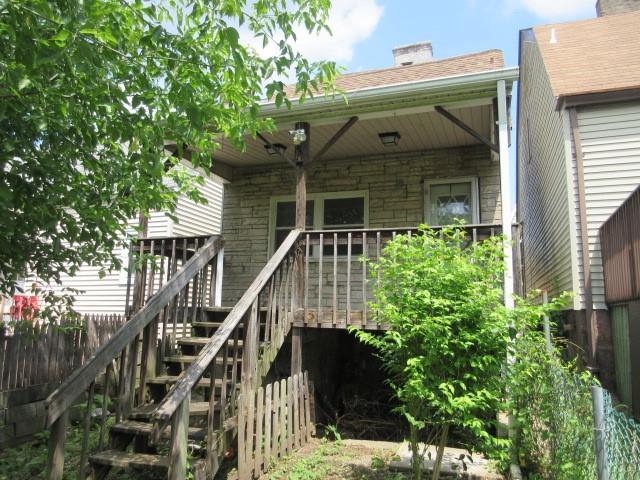 124 Irwin Street McKees Rocks, PA 15136 - Photo 18 of 18 front view of house with a small yard