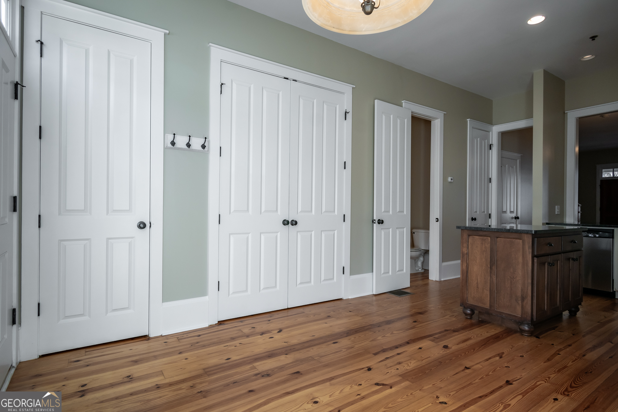 83 Charter Oak Drive Athens, GA 30607 - Photo 15 of 46 a view of a hallway with wooden floor
