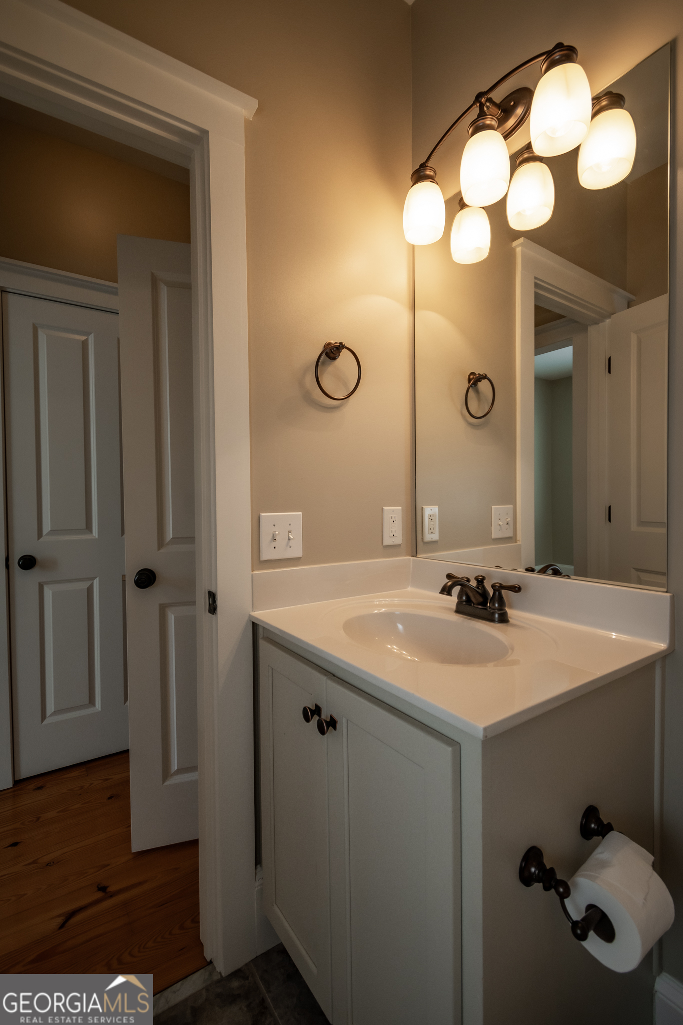 83 Charter Oak Drive Athens, GA 30607 - Photo 27 of 46 a bathroom with a sink vanity and a mirror