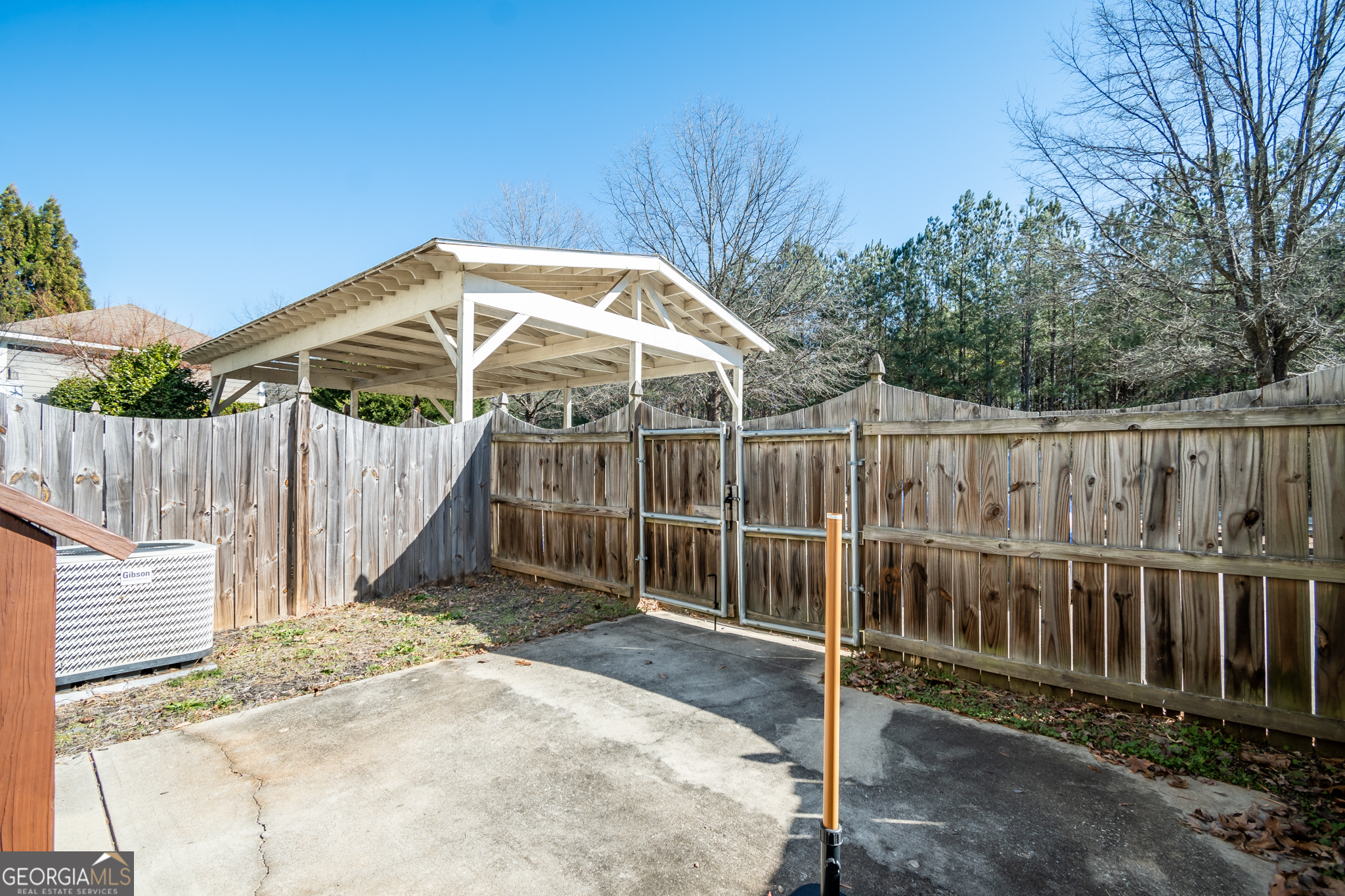 83 Charter Oak Drive Athens, GA 30607 - Photo 38 of 46 a backyard of a house with table and chairs