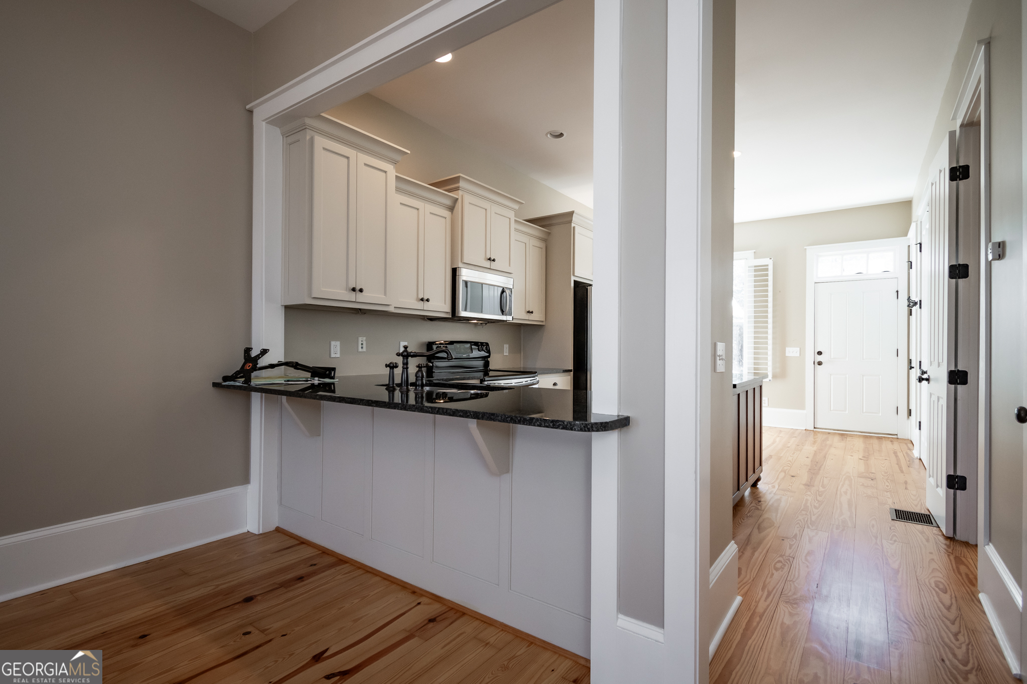 83 Charter Oak Drive Athens, GA 30607 - Photo 7 of 46 a view of a kitchen from the hallway