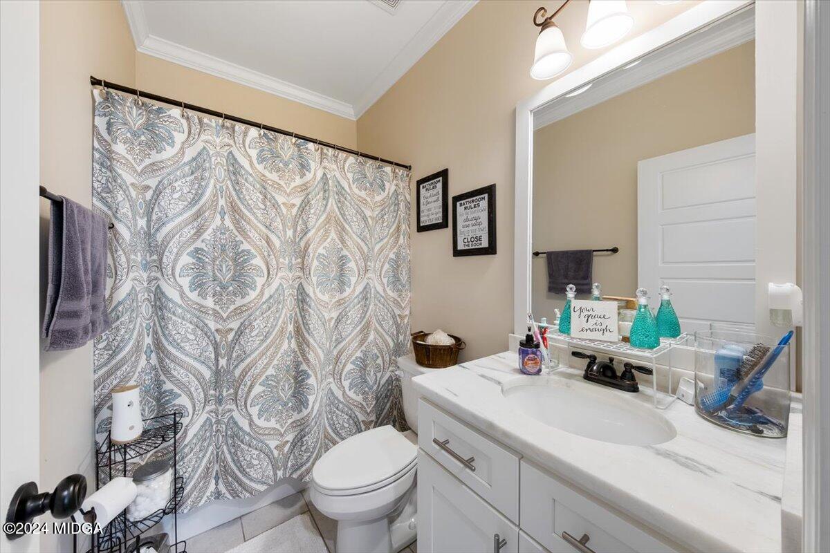 155 Carters Way Forsyth, GA 31029 - Photo 16 of 28 a bathroom with a sink toilet and shower