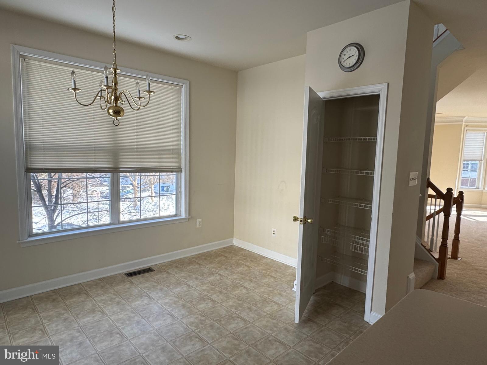 42474 Magellan Square Brambleton, VA 20148 - Photo 17 of 31 a view of an empty room with a window