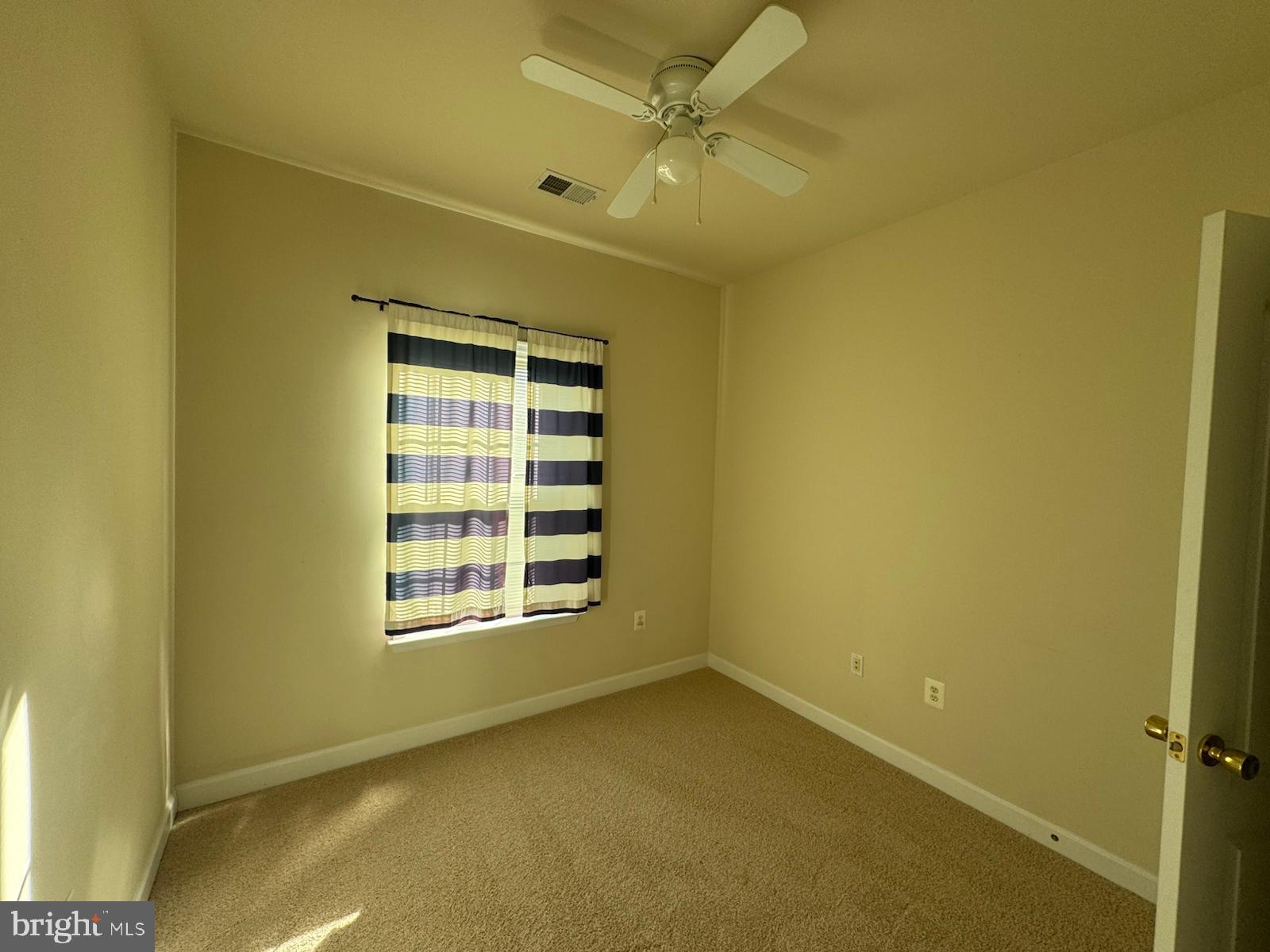 42474 Magellan Square Brambleton, VA 20148 - Photo 27 of 31 a view of an empty room with a window