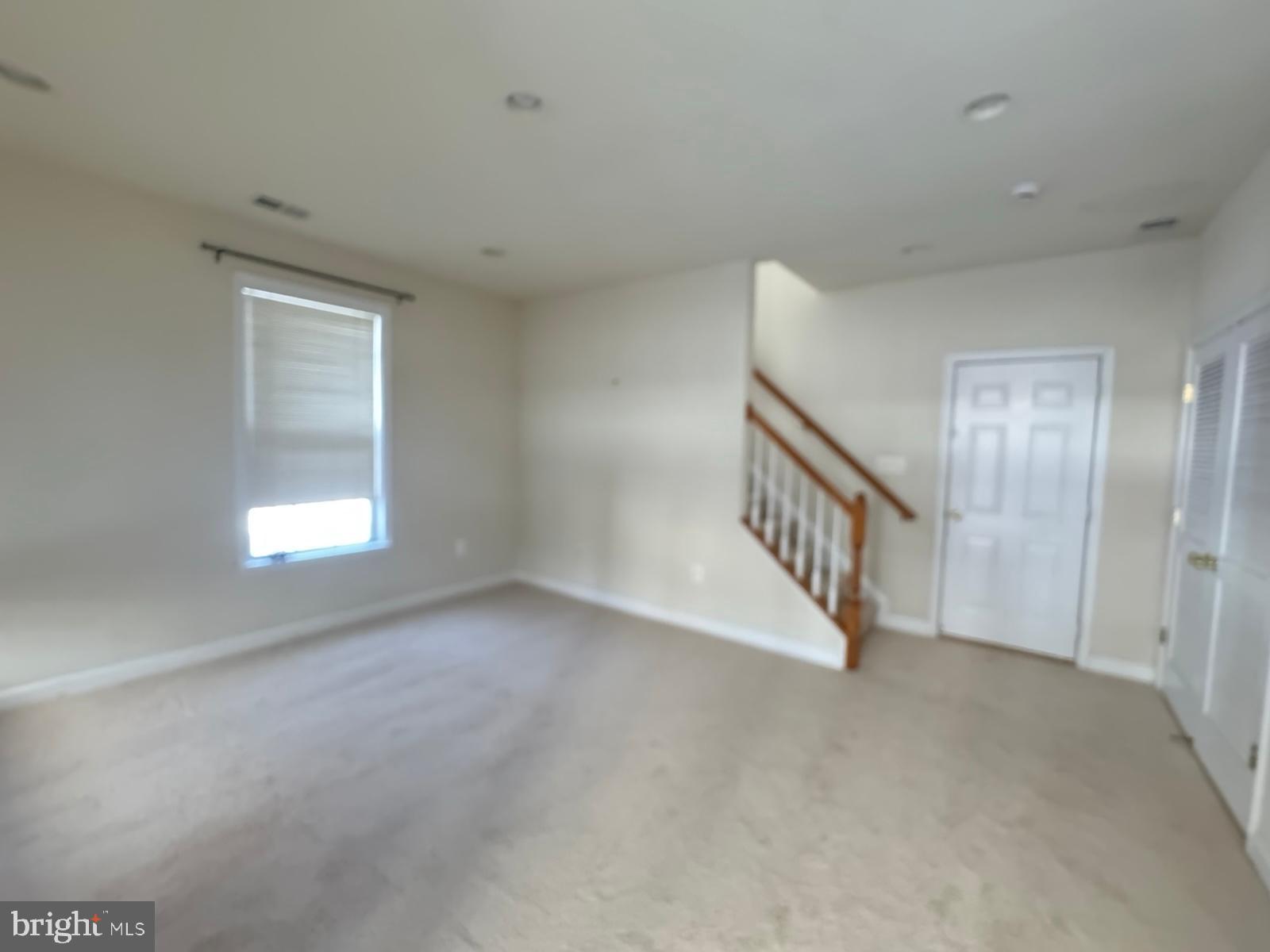 42474 Magellan Square Brambleton, VA 20148 - Photo 8 of 31 a view of an empty room with a window