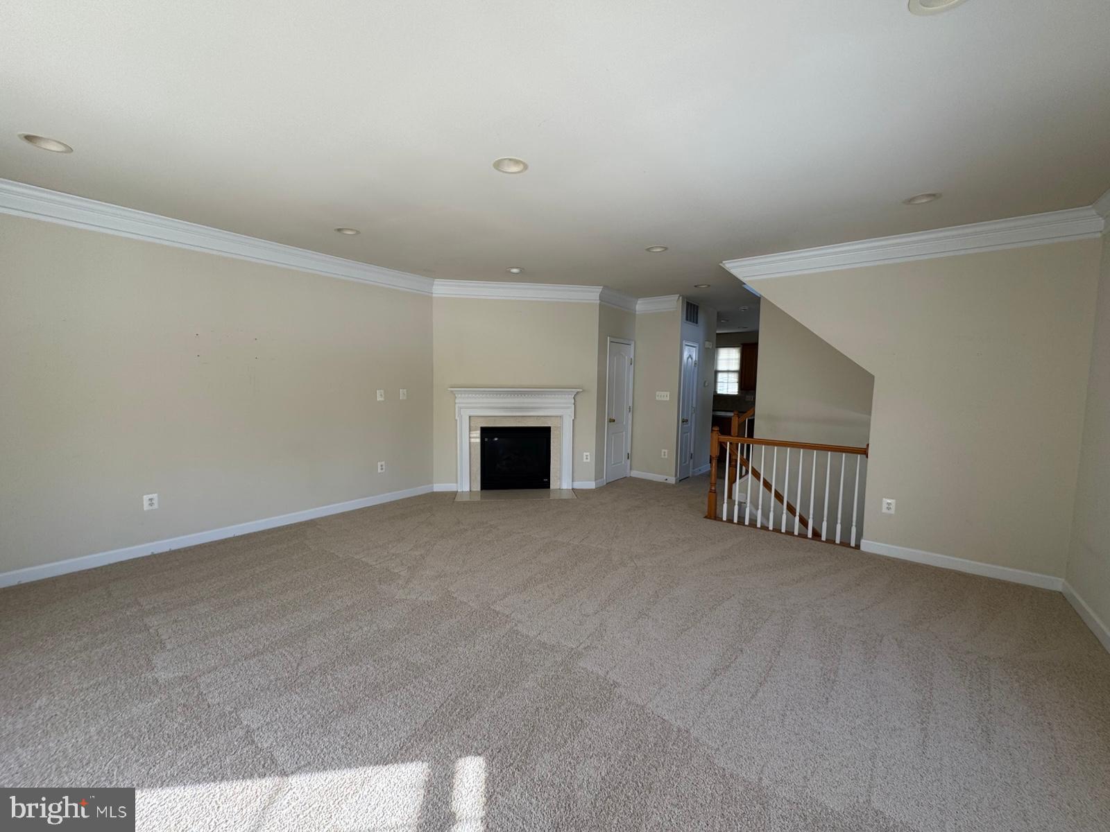 42474 Magellan Square Brambleton, VA 20148 - Photo 10 of 31 a view of empty room with a fireplace