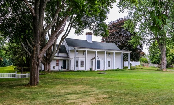 21 Endicott Road Boxford, MA 01921 - Photo 1 of 30 a front view of a house with a garden and trees
