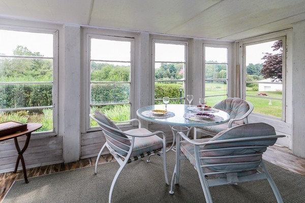 21 Endicott Road Boxford, MA 01921 - Photo 14 of 30 a view of a dining room with furniture window and outside view