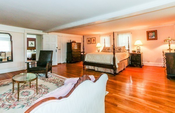 21 Endicott Road Boxford, MA 01921 - Photo 20 of 30 a bedroom with furniture and a wooden floor