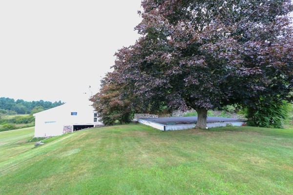 21 Endicott Road Boxford, MA 01921 - Photo 27 of 30 a view of a backyard with large trees