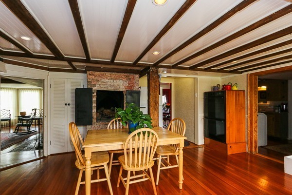 21 Endicott Road Boxford, MA 01921 - Photo 3 of 30 a view of a dining room with furniture wooden floor and chandelier